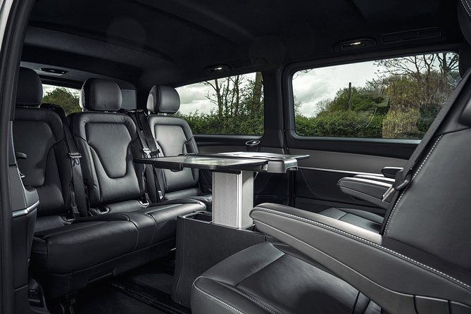 Airport Transfer: Milan to Malpensa Airport MXP by Luxury Van - Leaving Milan with a driver at the door