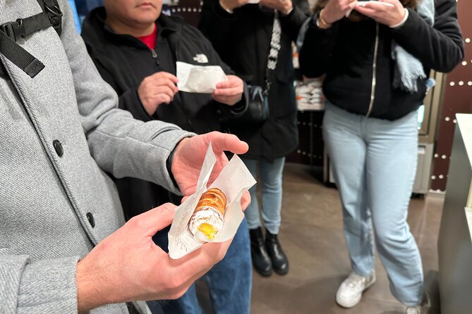Delicious Milan Street Food Tour Tasting and Sightseeing with Local Guide - Panettone makes the food portion distinctly Milanese