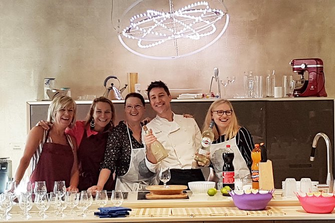 Italian Cocktail + Art of Making Pasta Cooking Class In Unique Milan Location - A Milan cooking class with a drink in hand