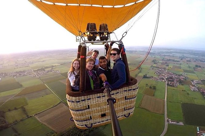 Lombardy Hot Air Balloon Flight Milan - Landing, toasting, and returning to Milan