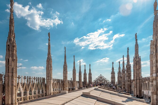 Milan: Cathedral and Duomo's Rooftop Guided Tour - Inside the Duomo: a focused one-hour introduction