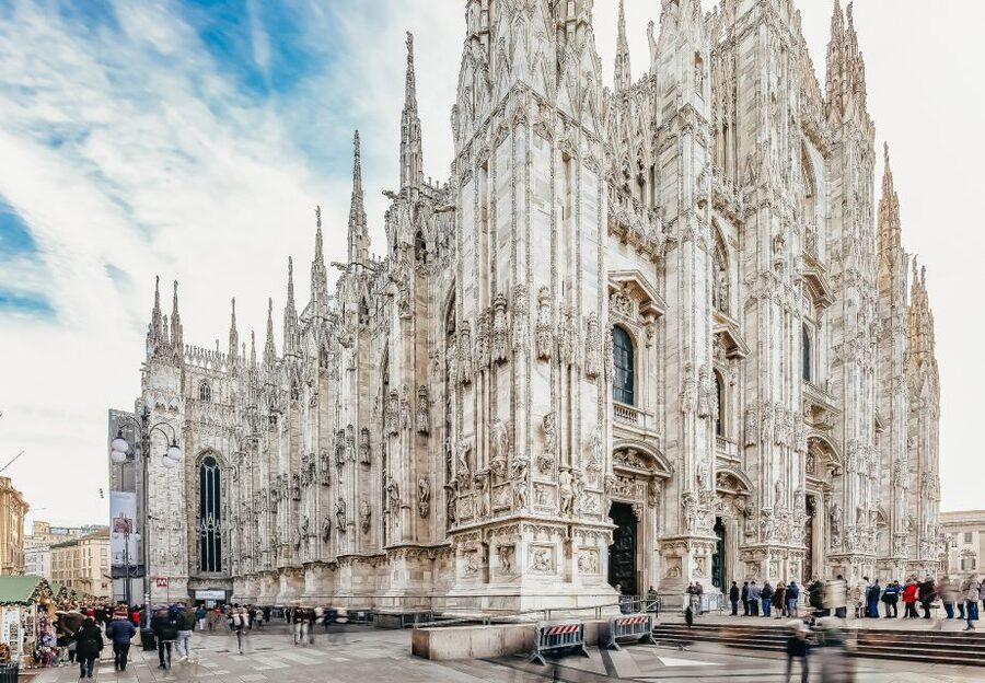 The marble front of the Duomo across Piazza del Duomo, Milan