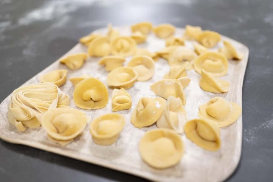 Milan: Pasta, Gnocchi and Tiramisù Cooking Class with Wine - Shaping gnocchi with truffle sauce