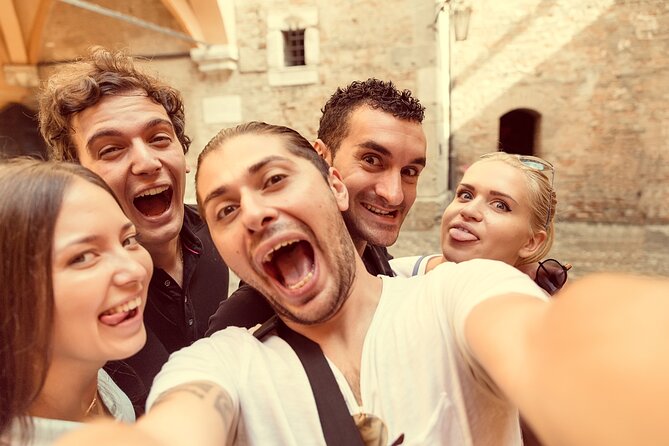 Milan Treasure Hunt for Groups of Friends, Team Building & Company Incentives - Reading the details around Milan’s Duomo