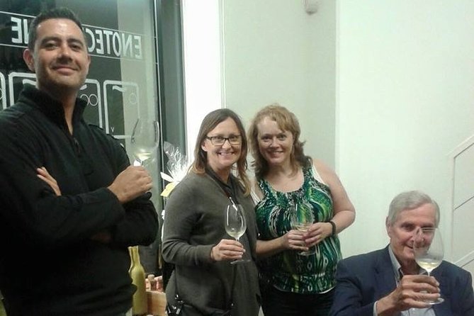 Milan Wine Tasting with Italian Sommelier - Cheese, cured meats, olives, and local bread